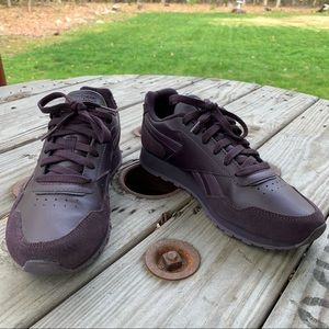 Maroon Reebok sneakers